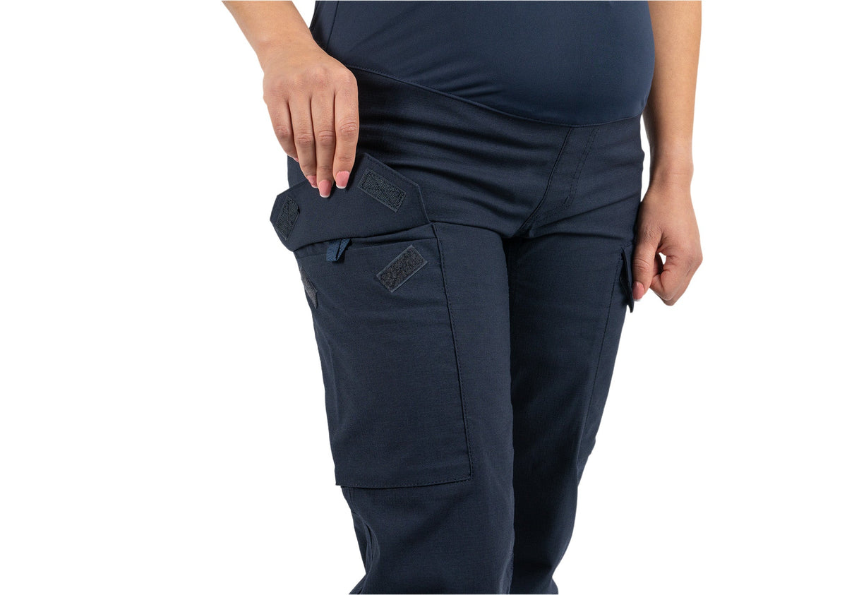 Close-up view of open cargo flap pocket showing Velcro closure |color_midnight navy